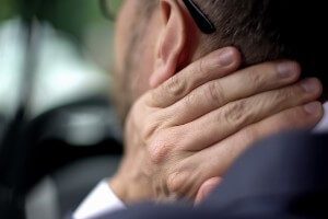 accident victim experiencing neck pain