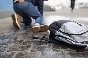 man slips and falls on public sidewalk