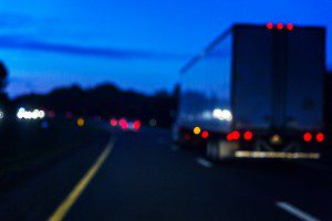 tractor-trailer traveling early morning hours