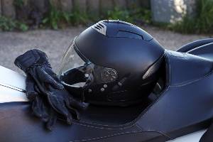 motorcycle helmet on top of bike