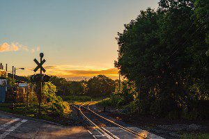 train crash strikes vehicle injures two