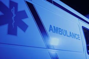 blue light on side of ambulance