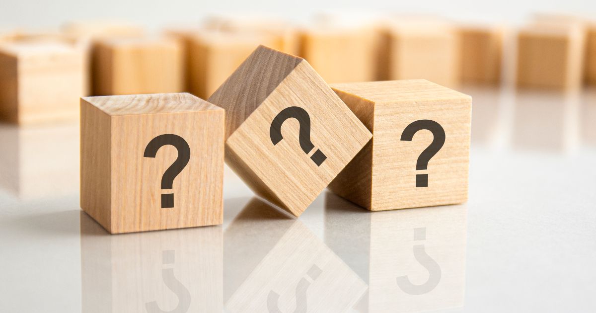 wooden blocks with question marks