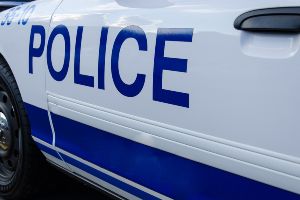 police car with blue lettering