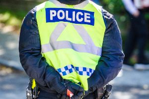 police officer in yellow vest