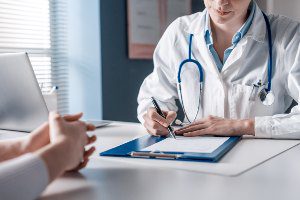 female doctor meeting with patient
