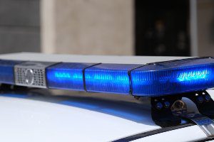 blue lights on top of police car