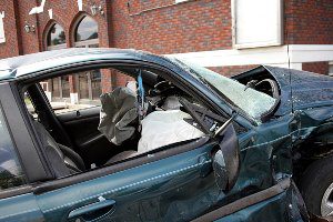 totaled car after building crash