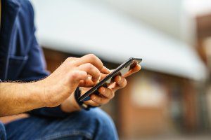 man using smartphone