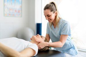 massaging patients neck
