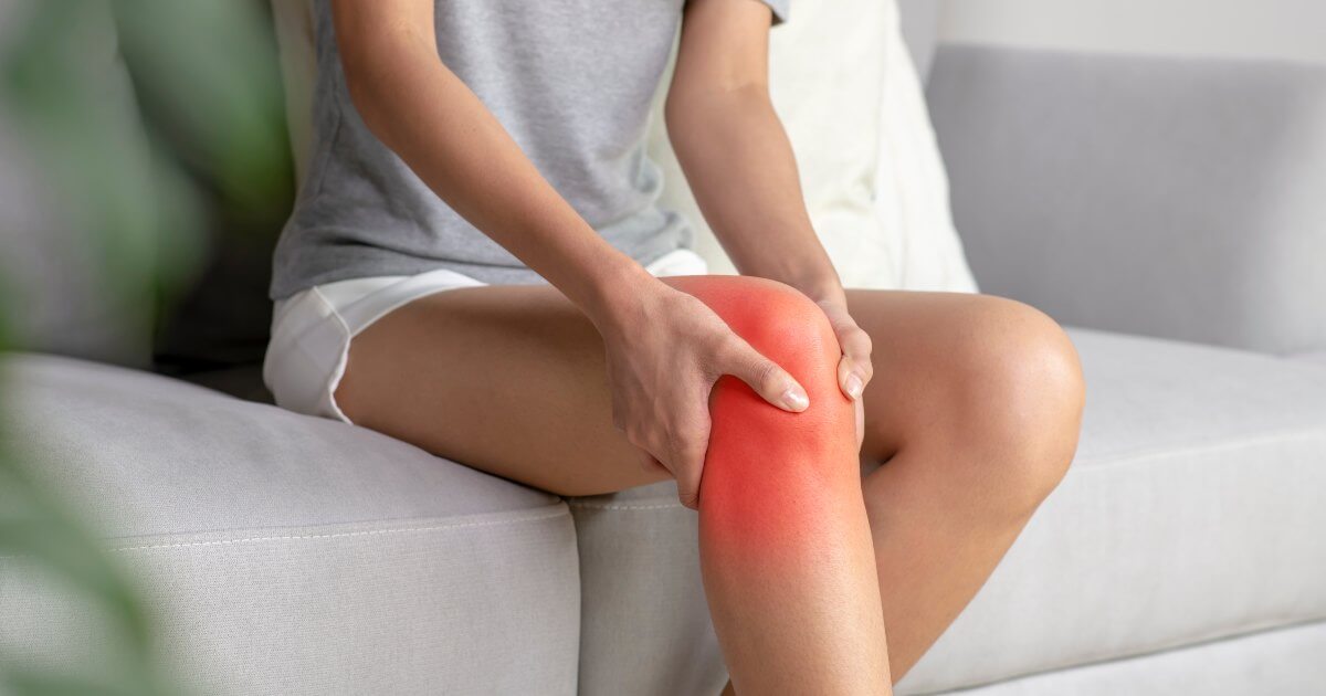 woman with painful injury to knee