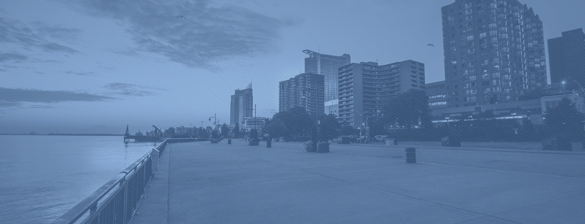 cityscape graphic with blue overlay