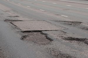 car accidents caused by potholes