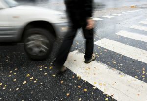 pedestrian crossing the street