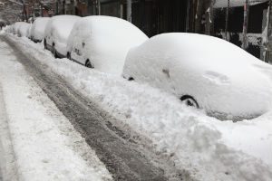 cars covered in snow