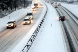 snowy highway with traffic