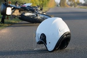 motorcycle helmet on roadway