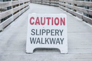 slippery walkway caution sign