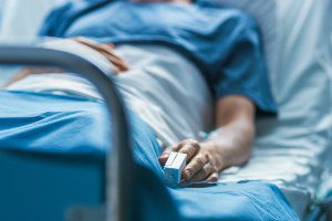 patient confined to hospital bed