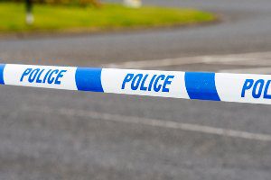 white and blue police tape