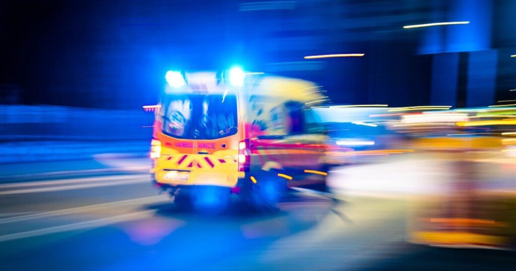 ambulance racing to hospital at night