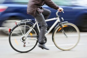 Bicyclist Injured When Hit by Flatbed Truck Mirror