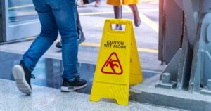 Can Windsor Property Owners Avoid Liability for a Slip and Fall With a ‘Wet Floor’ Sign?