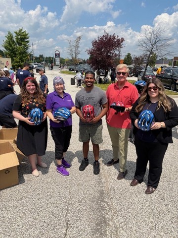 Giving Back: Helmets for Children of Camp Brombal