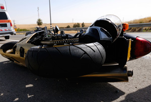 crashed motorcycle on roadway